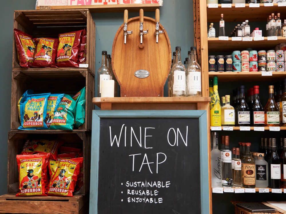 A wine barrel saying "wine on tap".