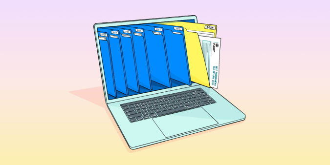 A laptop with paper files on the screen