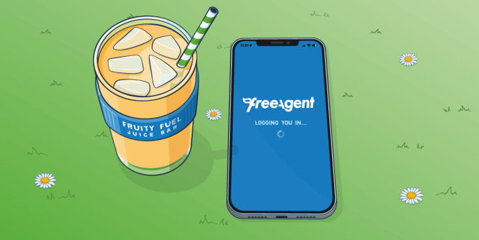 Phone sitting on a field of daisies in the sun, showing the FreeAgent mobile app loading.