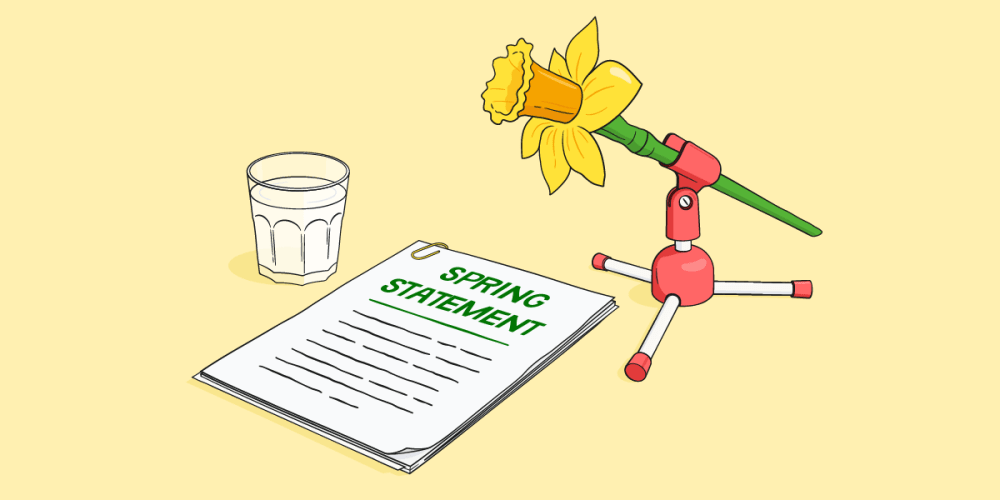 A daffodil-shaped microphone beside a pile of papers saying "Spring Statement".