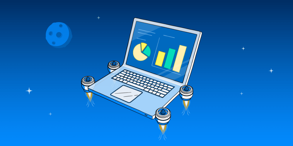 A laptop on a desk in front of a notice board covered with notices, paperwork and a calendar
